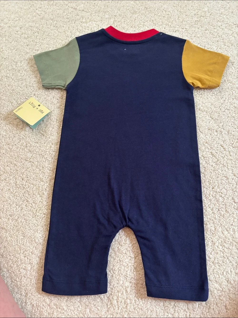 Tea Collection Navy One-Piece Romper with Red, Yellow, Olive Accents